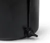 A close-up view of a black plastic fitting on a larger black object, likely a container or tank. Produktbild-Vorschau