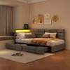 A bedroom scene with a bed, pillows, and decorative wall art. Produktbild-Vorschau