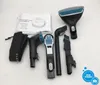 A collection of cleaning attachments and a manual for a portable spot cleaner are laid out on a white surface. Produktbild-Vorschau