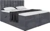 A dark gray upholstered box spring bed with a headboard, two pillows, and a folded blanket. Produktbild-Vorschau