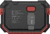 The back of a black and red work light with product information and certifications printed on it. Podgląd zdjęcia produktu