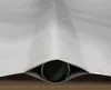 A close-up view of a black cylindrical object partially covered by a white tarp or fabric. Produktbild-Vorschau