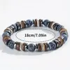Elastische armband met parels van gepolijste steen, houten Productafbeelding-voorbeeld 1