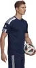 A man wearing an Adidas t-shirt and shorts, holding a soccer ball. Voir les images du produit