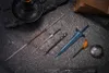A collection of fantasy-themed weapons and accessories laid out on a dark, rocky surface. Produktbild-Vorschau