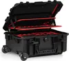 An open black transport case with red interior lining and tool organizers, resting on wheels. Produktbild-Vorschau