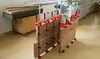 Woodworking clamps are being used to hold together pieces of wood that are being glued. Voir les images du produit