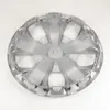 A silver-colored wheel cover is shown against a white background. Produktbild-Vorschau