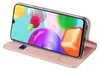 A pink flip case for a Samsung Galaxy A41 phone, shown in a stand-up position with the phone screen displaying a colorful abstract image. Anteprima dell’immagine prodotto