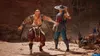 Two characters from Mortal Kombat 1 are shown in a desert environment. Anteprima dell’immagine prodotto