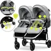 A twin stroller with various features highlighted by numbered callouts and inset diagrams. Produktbild-Vorschau
