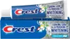 A tube of Crest toothpaste and its box. Produktbild-Vorschau
