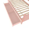 Close-up view of the drawers and wooden slats of a pink bed frame. Náhľad obrázku produktu