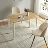 A dining table with two chairs in a room. Náhled obrázku produktu