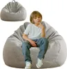 A young boy sits on a large, light gray beanbag chair. Another beanbag chair is shown in the background. Produktbild-Vorschau