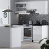 A modern kitchen with white cabinets, a stainless steel oven, and a dark herringbone backsplash. Produktbild-Vorschau