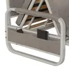 A close-up view of the side of a sofa bed, showing storage pockets attached to the frame. Produktbild-Vorschau