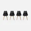 Four black chairs with wooden legs are arranged in a row against a light gray background.
