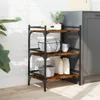 A kitchen shelf unit with various kitchen items on it, placed next to a kitchen cabinet and a brick wall. Náhľad obrázku produktu
