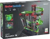 The image shows the packaging of a Fischertechnik building toy set, specifically the Dynamic M model. The packaging features a prominent image of the assembled toy, which is a marble run with various tracks and mechanisms. Information such as age recommend Voir les images du produit