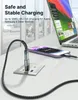A charging cable is plugged into a wall outlet and a smartphone, with a laptop in the background. Produktbild-Vorschau