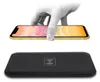 A hand is shown placing a smartphone onto a wireless charging pad. Produktbild-Vorschau