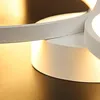 A close-up shot of a modern white LED ceiling light with a ring design. Produktbild-Vorschau