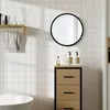 A bathroom scene with a mirror, cabinet, and bathtub. Produktbild-Vorschau