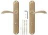A pair of bronze door handles and their accompanying hardware are displayed against a white background. Produktbild-Vorschau