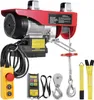 A red electric hoist with various accessories, including remote controls and straps, is displayed against a white background. Voir les images du produit