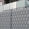 A close-up view of a grey privacy screen fence installed on a balcony. Produktbild-Vorschau