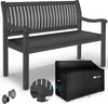 A dark gray garden bench is shown in the center of the image, with a black protective cover for a grill or similar item in the bottom right corner. There are also two small circular objects in the bottom left. Náhled obrázku produktu