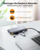 A USB-C docking station connected to a laptop, with informational graphics above. Produktbild-Vorschau