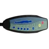 A close-up of a massage chair remote control with various buttons and indicators. Voir les images du produit