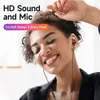A woman is wearing black earphones and smiling with her eyes closed, suggesting she is enjoying music. Voir les images du produit