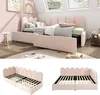 A pink upholstered bed frame with a scalloped headboard, shown in a bedroom setting and as separate components. Podgląd zdjęcia produktu