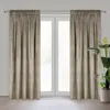 A pair of beige curtains hanging in front of a window. Podgląd zdjęcia produktu