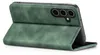A green flip cover case for a smartphone is shown from a side angle, propped open. Produktbild-Vorschau