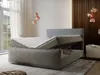 A bedroom scene featuring a bed with its storage compartment open. Produktbild-Vorschau