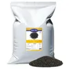 A large bag of birdseed with a pile of seeds in front of it. Produktbild-Vorschau