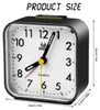 A close-up, slightly angled view of a black analog alarm clock against a white background. The clock face shows the time, brand logo, and the word "QUARTZ". Text overlays indicate "PRODUCT SIZE" and dimensions. Produktbild-Vorschau