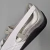 A close-up view of the heel and side of a PUMA SPEEDCAT METALLI shoe. Voir les images du produit