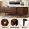 A marketing image showcasing a wooden TV stand with close-up details of its features. Voir les images du produit