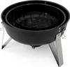 A black charcoal grill with silver legs is shown against a white background. Podgląd zdjęcia produktu