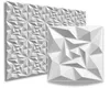Two white 3D wall panels with geometric patterns are displayed against a white background. One panel is larger and positioned in the background, while a smaller, single panel is in the foreground. Produktbild-Vorschau