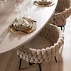 A dining table setting with chairs, featuring place settings and glassware. Produktbild-Vorschau