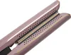 A close-up view of the plates of a hair straightener. Anteprima dell’immagine prodotto