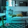 A modern living room with a bubble lamp, sofa, and table. Produktbild-Vorschau