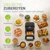 An air fryer surrounded by various foods it can prepare, with text highlighting its features. Produktbild-Vorschau