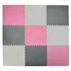A grid of interlocking foam puzzle mats in pink and gray. Produktbild-Vorschau